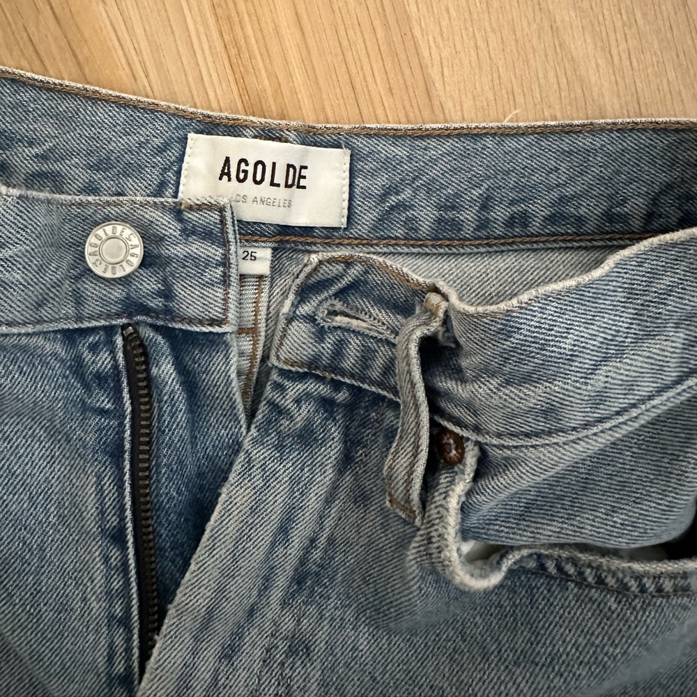 AGOLDE pinch waist kick flare jeans.